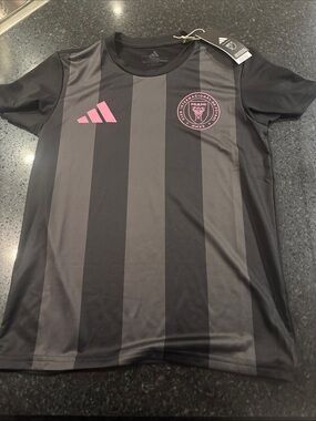 adidas XS women’s black and Pink Striped Messi Soccer Jersey